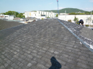 屋根面シーラー接着剤塗布工事